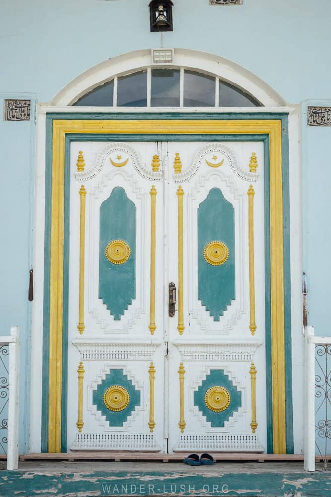 A colourfully painted mosque door in Lahic, Azerbaijan.