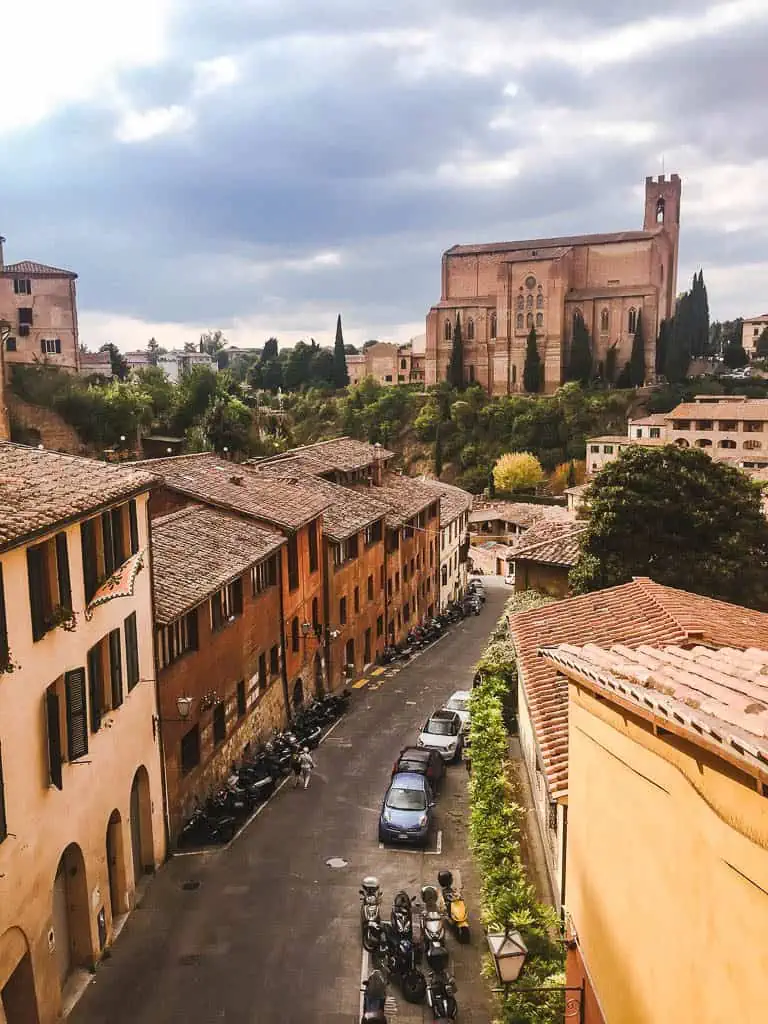 View of Siena in Tuscany with houses down a street