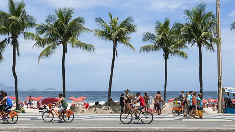 MareMagnum/Getty Images Digital nomads are drawn to Rio by the work-life balance, with locals loving socialising and being outdoors (Credit: MareMagnum/Getty Images)