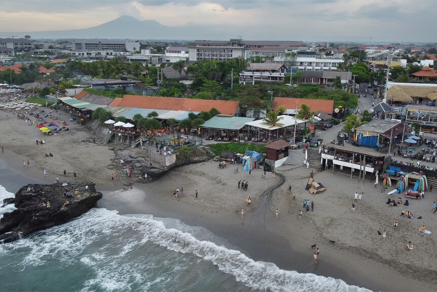 A drone shot of a crowded beach 