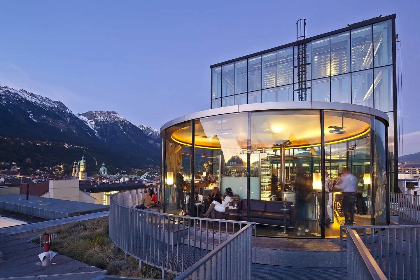 See views of Innsbruck’s towering mountains from the 360-degree bar, Cafe Lichtblick.