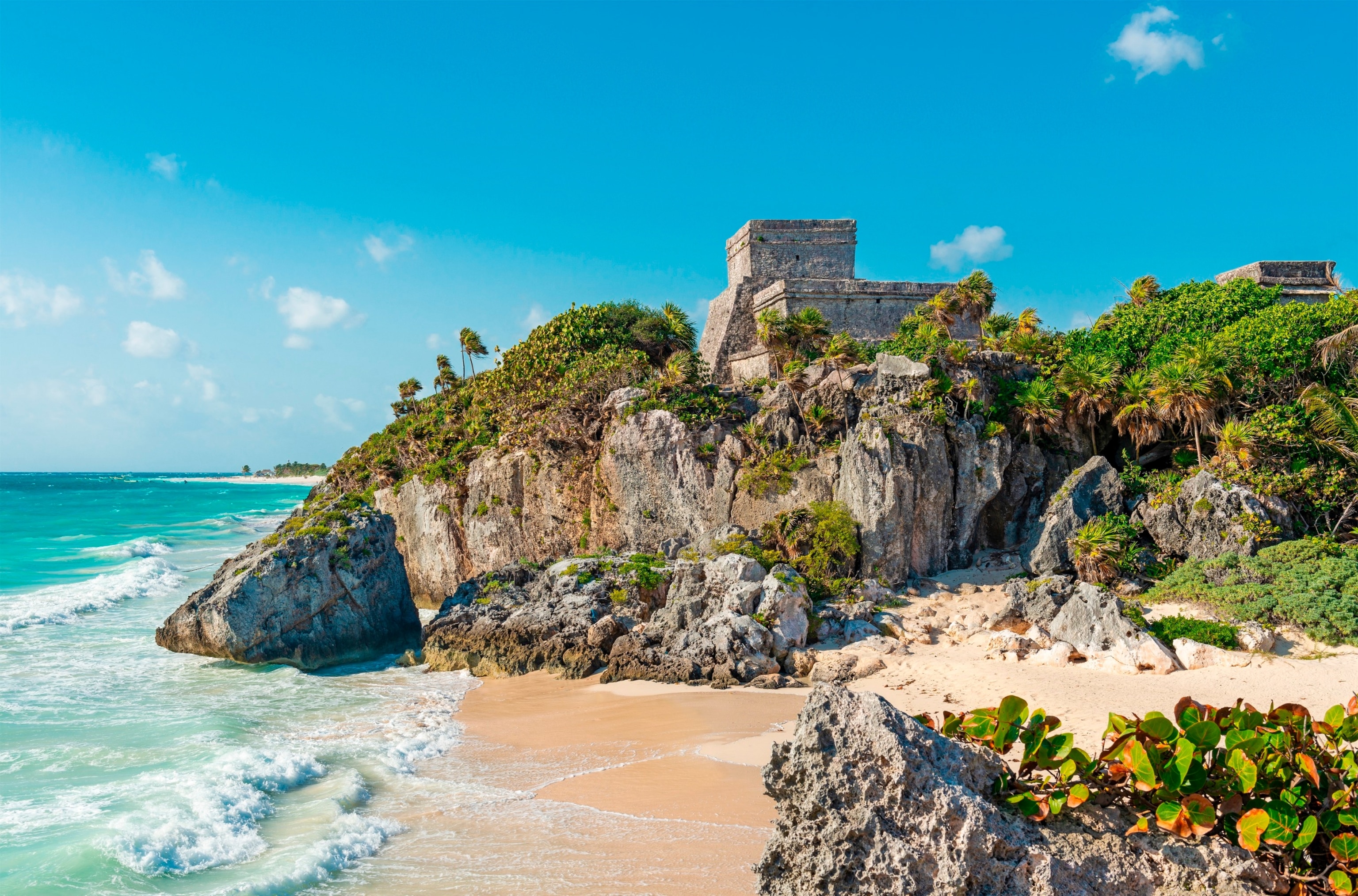 PHOTO: Tulum beach and maya temple ruins by Caribbean Sea, Yucatan, Mexico.