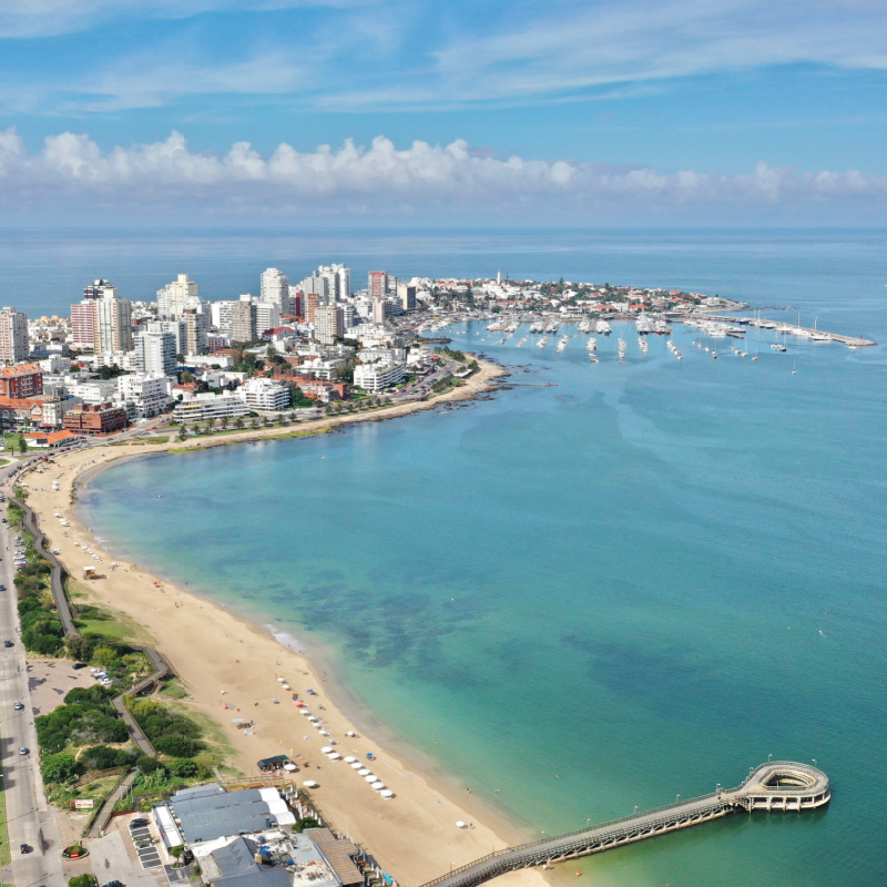 beach and pier in punta del este uruguay, digital nomad concept