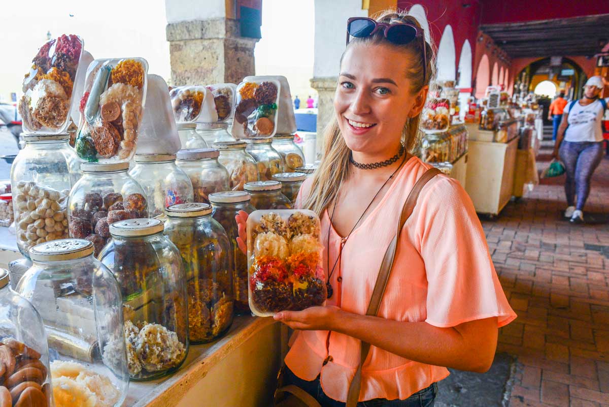 Bailey looks up sweets in Cartagena on a food tour