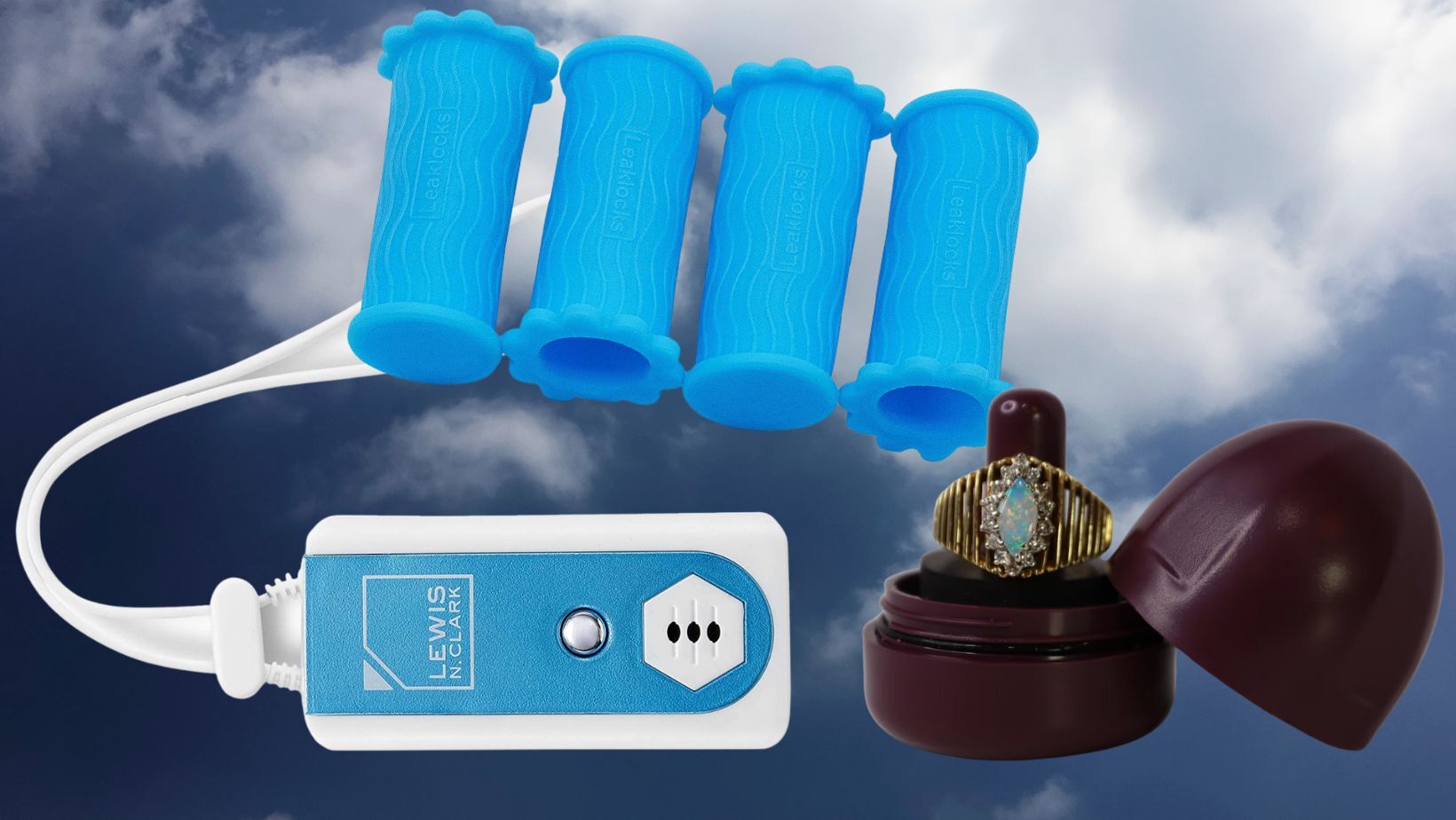 A travel door alarm, a pack of silicone toiletry bottle covers and a ring carrying case.