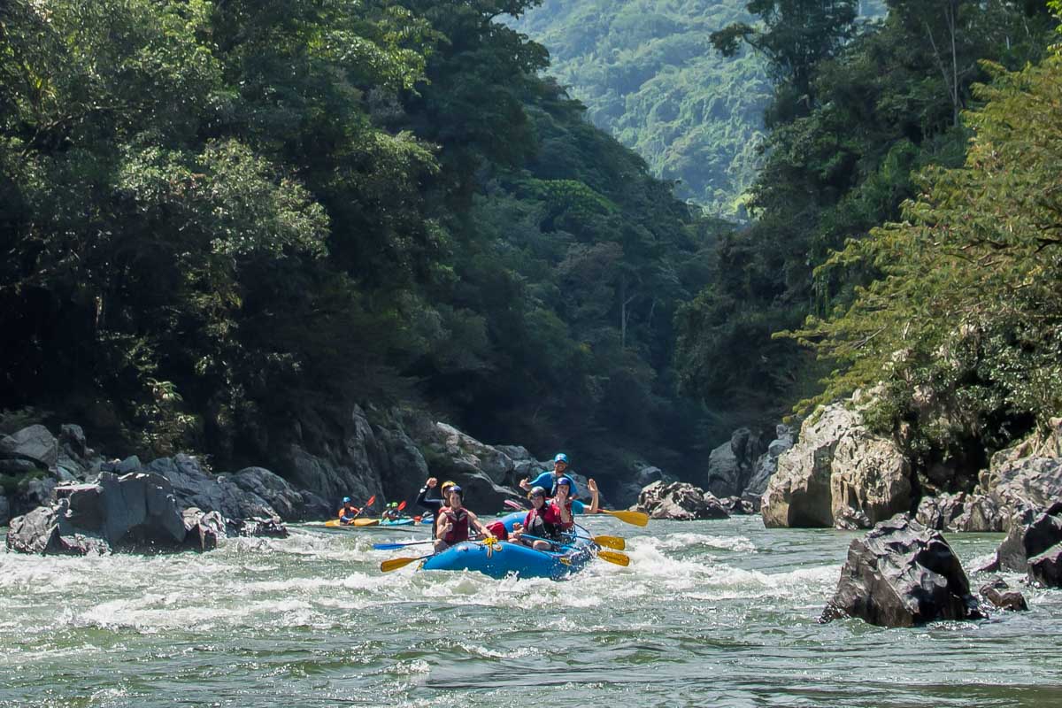 Rafting down a river near Medellin Colombia on a rafting tour