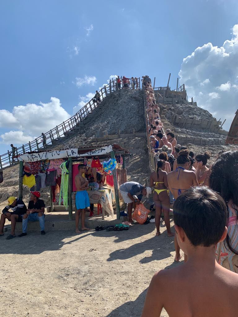 people lined up at the mud volcano in Cartangena