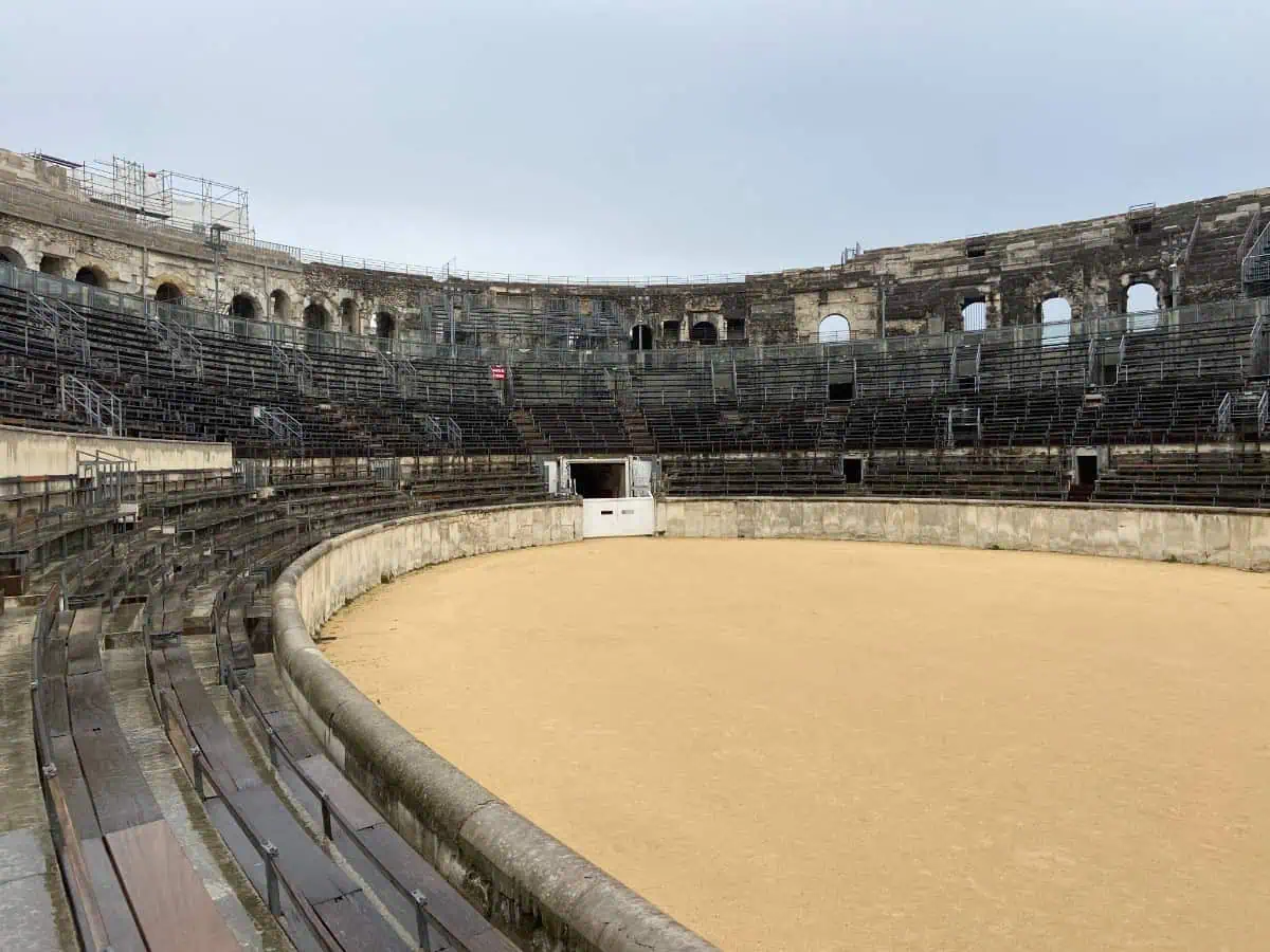 Inside of Nimes Arena with stands and amphitheatre floor