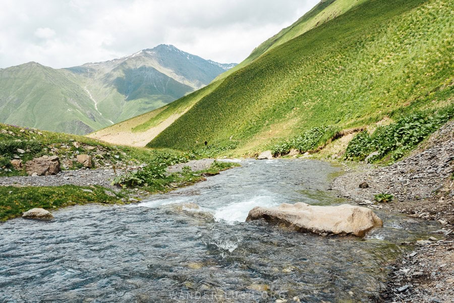 A mountain river with big rocks in Juta Valley.