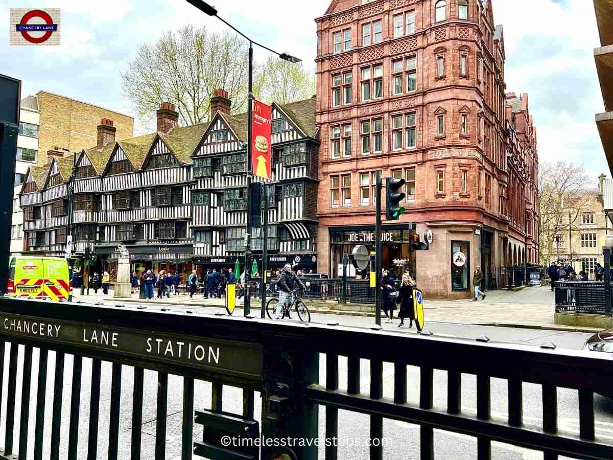 chancery lane station exit with the staple inn red brick building and tudor facade in the background.