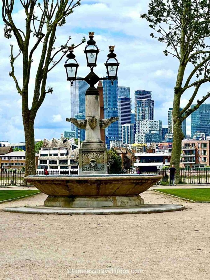 fountain and view of the city from the grounds of the old royal naval college