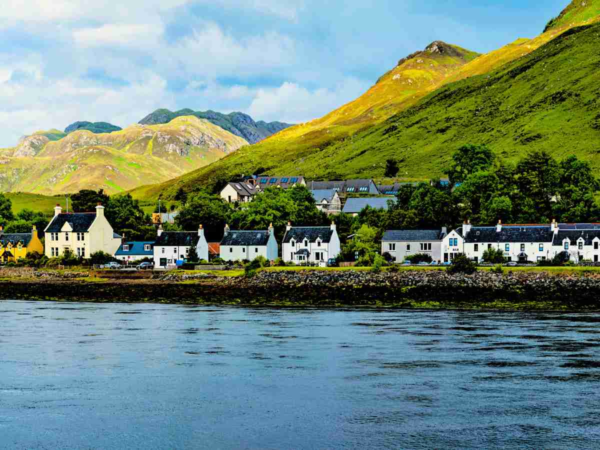 houses in the village of Dornie along the meeting point of Loch Duich, Loch Alsh and Loch Long Scotland