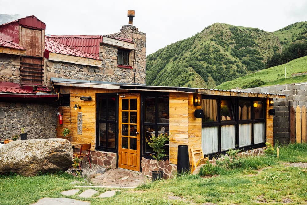 Maisi, a cute cabin restaurant in the Caucasus Mountains in Kazbegi, Georgia.