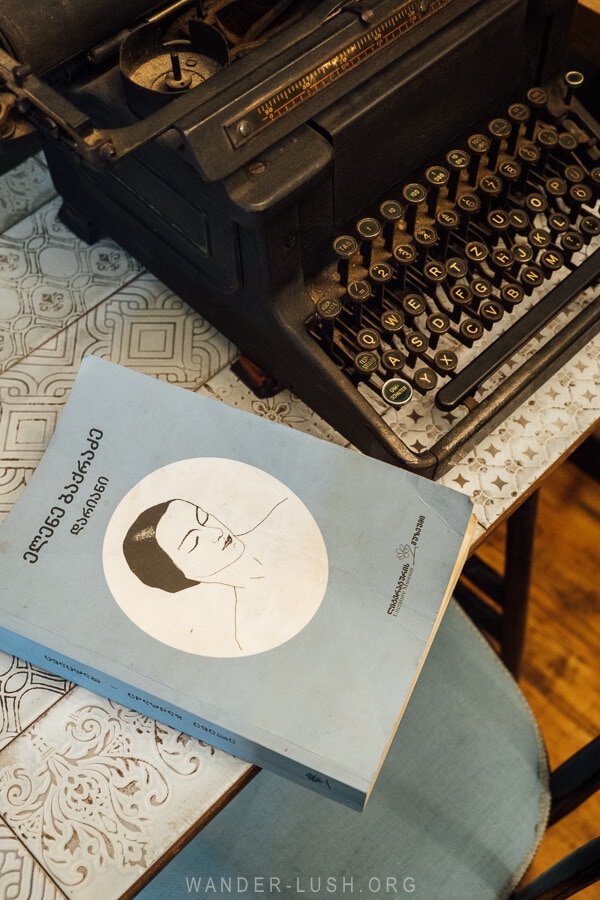 A poetry book and a vintage typewriter at Elene Dariani, a restaurant in Georgia.