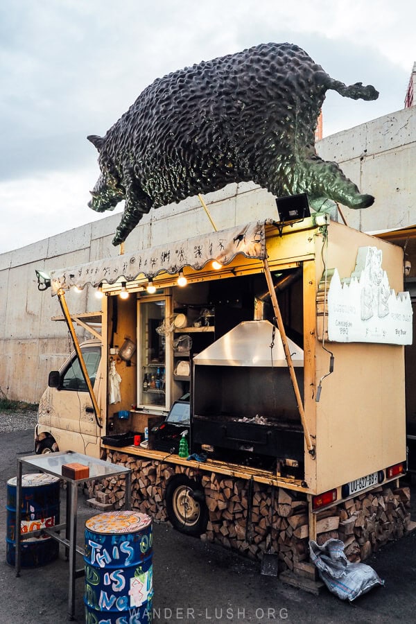 Big Boar, a Tbilisi food truck with a giant pig sculpture on top.