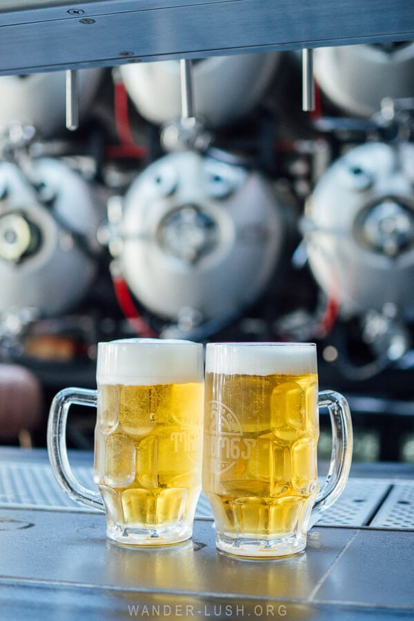 Two glasses of beer on the bar at 2 Tons beer restaurant.