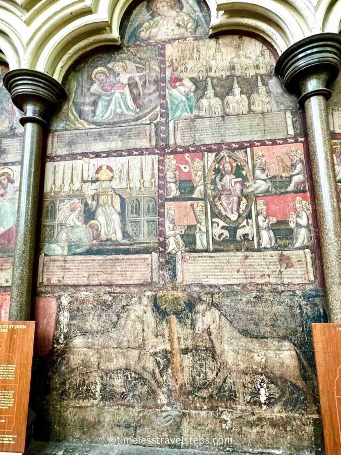 Image of the murals in the Chapter House at Westminster Abbey. The artwork, though some sections are faded, still displays rich colours and intricate details. These 14th-century murals depict scenes from the Apocalypse and the Last Judgement, showcasing the historical and artistic significance of the space.
