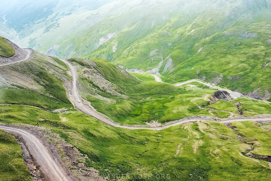 An aerial shot of the Datvisjvari Pass, a winding mountain road from Tbilisi to Khevsureti.