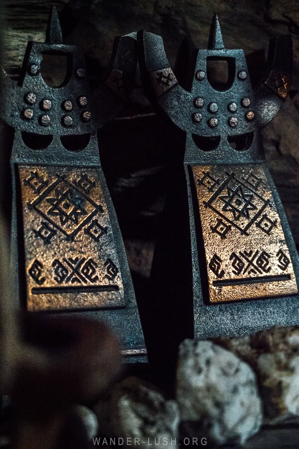 Khevsurian symbols decorate antiques at a guesthouse in Shatili.