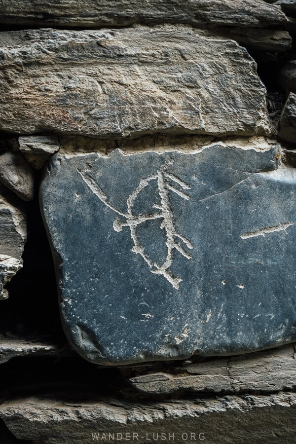 An engraved symbol on a stone tower house in Shatili.