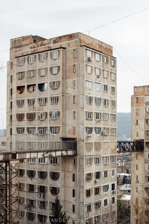 The Saburtalo Skybridge in Tbilisi, concrete apartment blocks linked by metal walkways.