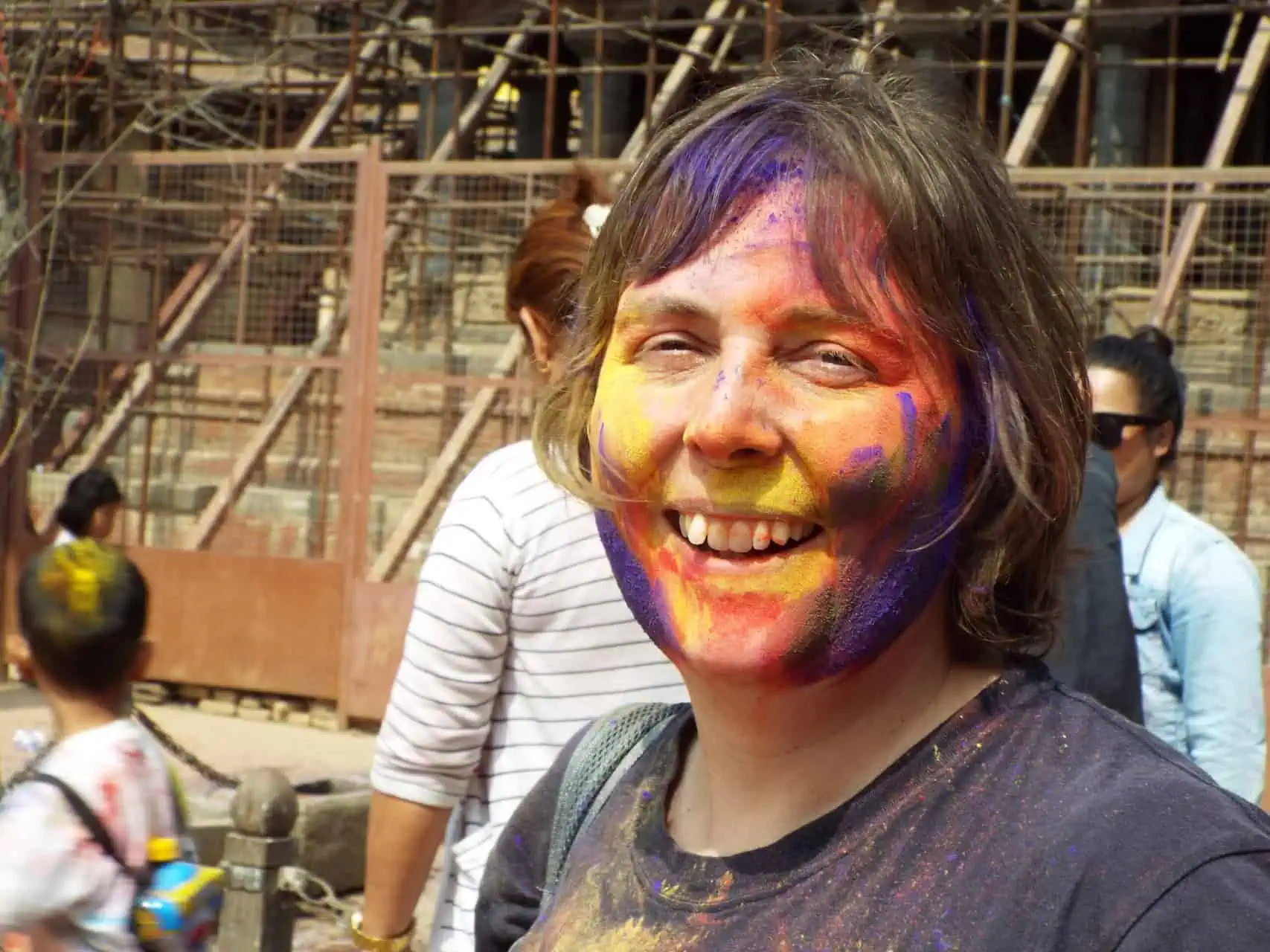 Mitch from Very Tasty World covered in colours and celebrating Holi in Nepal