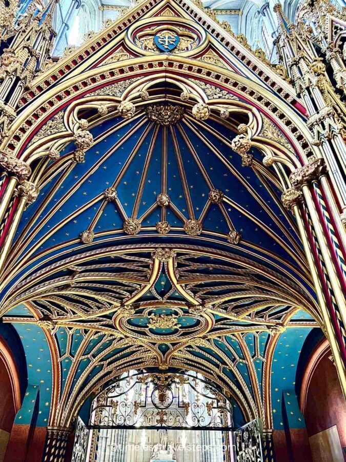 The Screen area at Westminster Abbey showcases the ornate, rich, and gold decoration of the screen and the ceiling. The intricate craftsmanship and lavish Gothic design create a stunning visual display.
