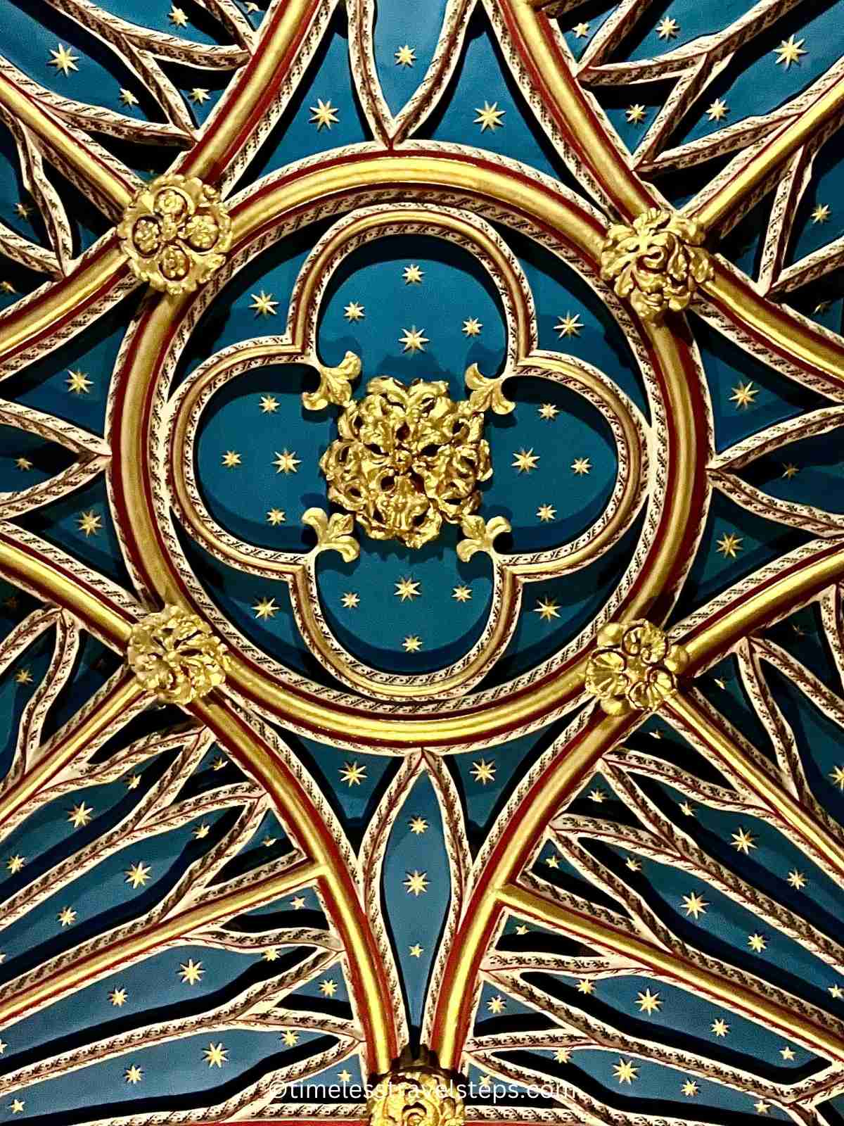 The Screen area at Westminster Abbey showcases the ornate, rich, and gold decoration of the screen and the ceiling. The intricate craftsmanship and lavish Gothic design create a stunning visual display.