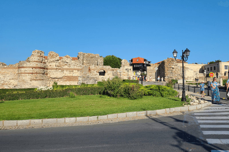 The ancient walls of old Town Nessebar sit semi-ruined around the modern tourist destination of the Nessebar peninsula in Bulgaria.