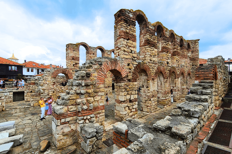 The impressive multi-storied remaining stone arches of St Sophia Basilica aka Old Metropolitan Church in the center of old town Nessebar Bulgaria.