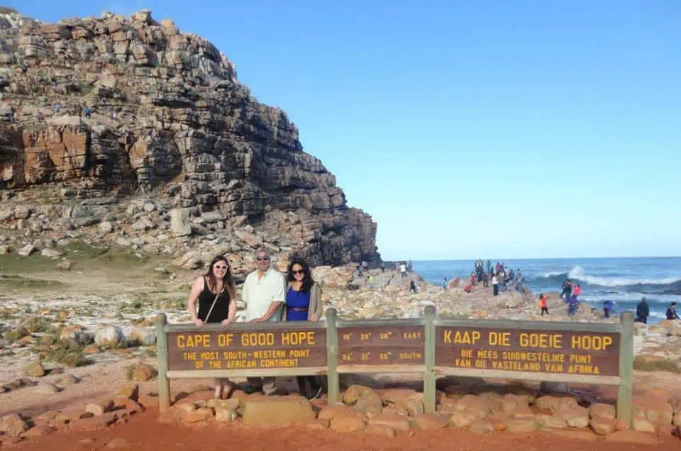 Riana and friends posing in front of the Cape of Good Hope sign outside of Cape Town, South Africa