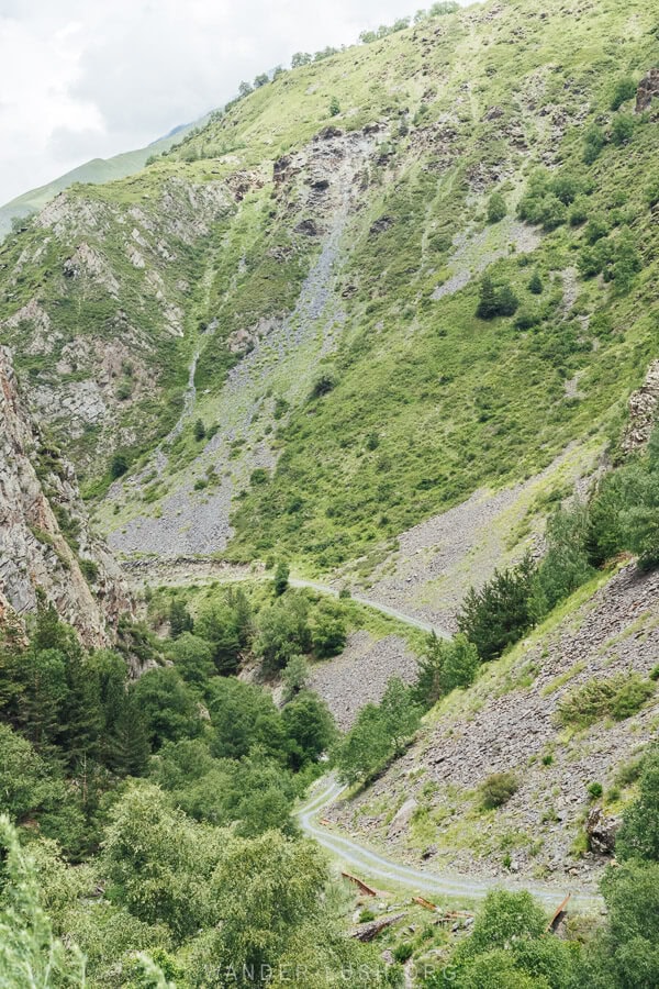 A thin road winds through the mountains near Mutso in Georgia.