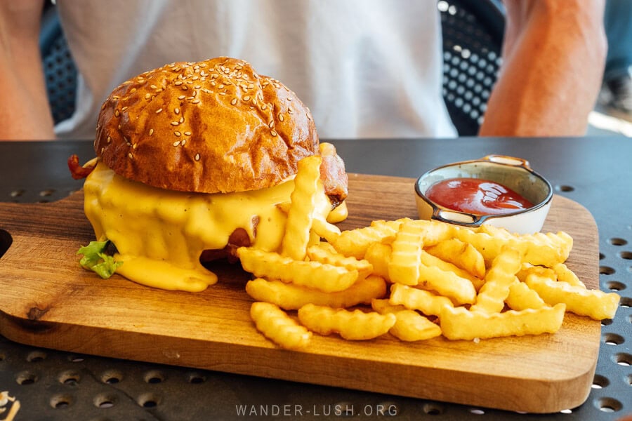 A burger and fries at Pioneers restaurant in Bakhmaro.