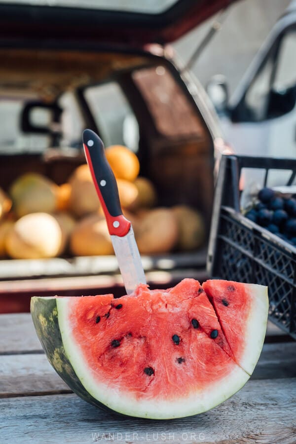 A slice of watermelon spiked with a knife at the Chokhatauri Market in Guria.