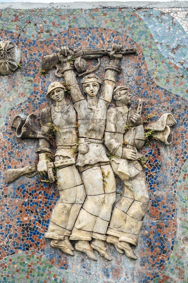 A Soviet mosaic at the WWII memorial in Chaisubani, Guria depicts three soldiers.