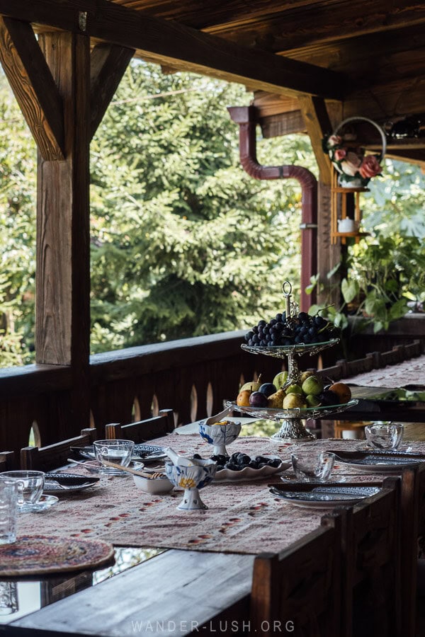 A veranda table set up for a tea tasting in Georgia.