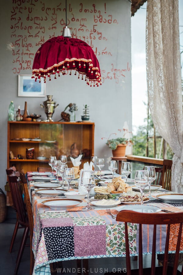 A table dressed for lunch on the veranda at Komli in Guria.