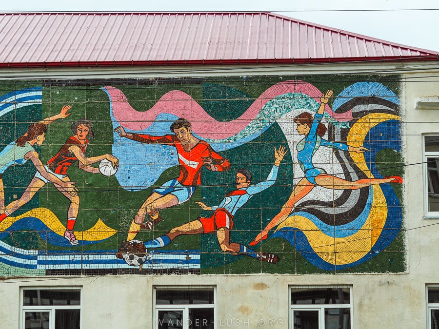 A Soviet-era mosaic depicting football players decorates a public school in Ozurgeti.