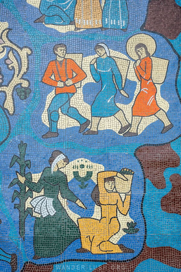 A blue mosaic of tea workers in the Georgia tea region.