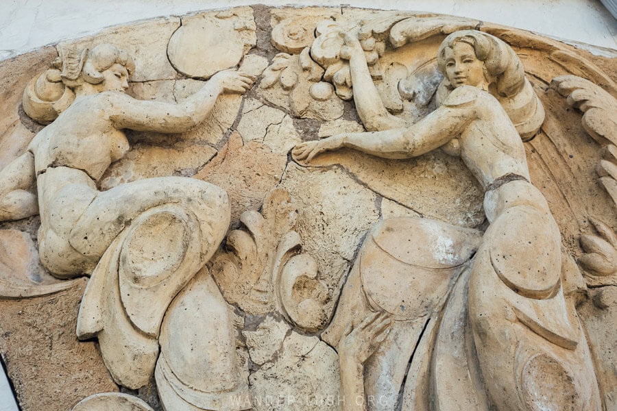 Soviet-style bas relief sculpture on the wall of a market in Georgia.