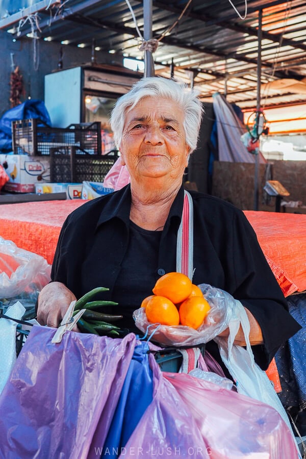 A woman selling chillis and lemons at the Dezerter Bazaar in Tbilisi.