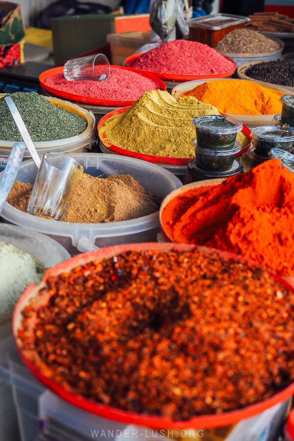 Piles of colourful spices at a shop at the Dezerter Bazaar in Tbilisi.