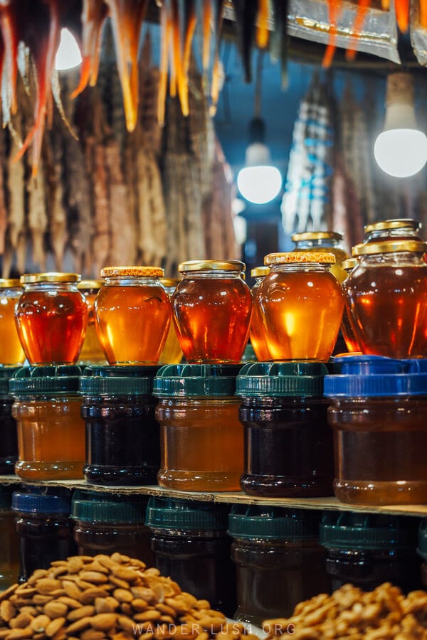 Jars of honey inside a farmer shop at the Dezerter Bazaar market in Tbilisi.