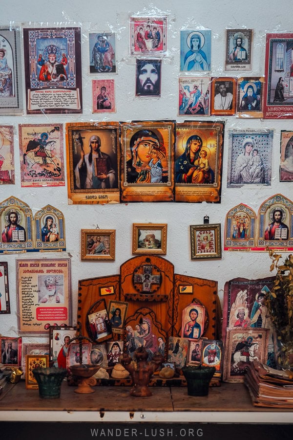 A makeshift altar with Orthodox icons inside the Dezerter Bazaar in Tbilisi.