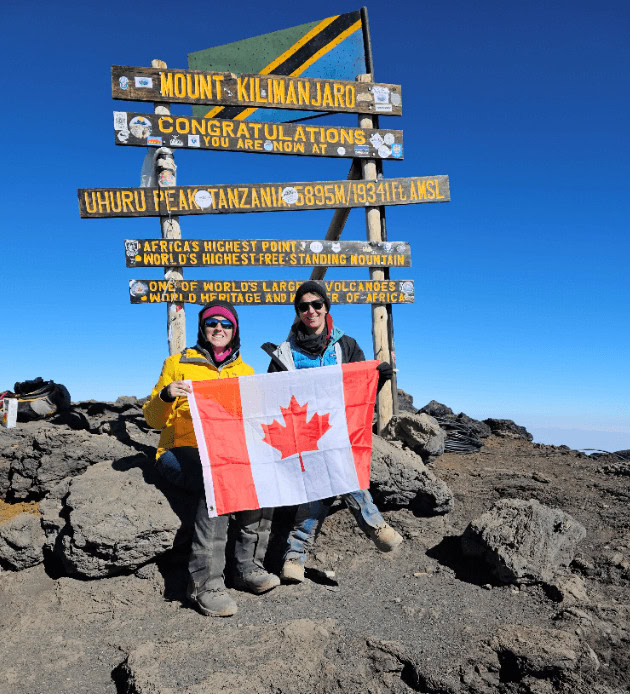 Emma at the summit of Mt Kilimanjaro