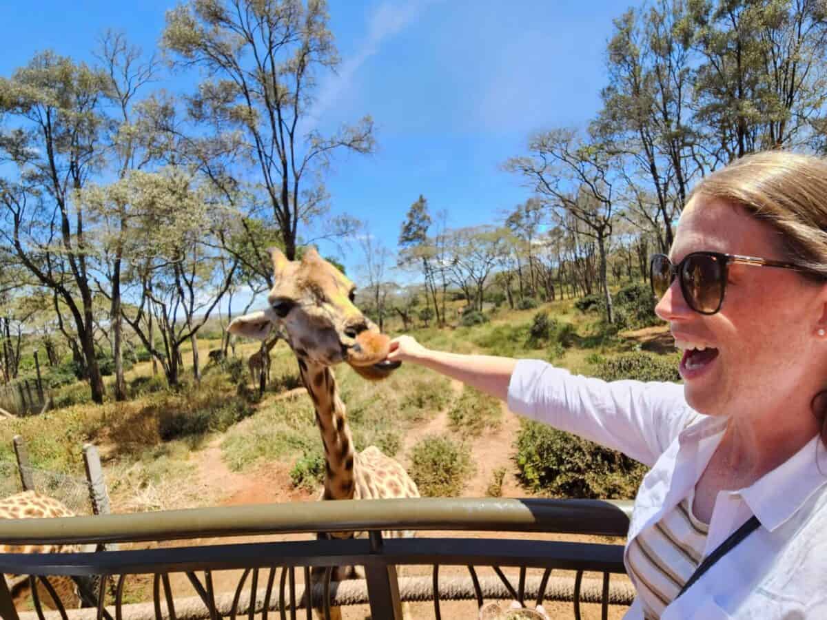 Emma feeding giraffes at Giraffe Centre in Nairobi