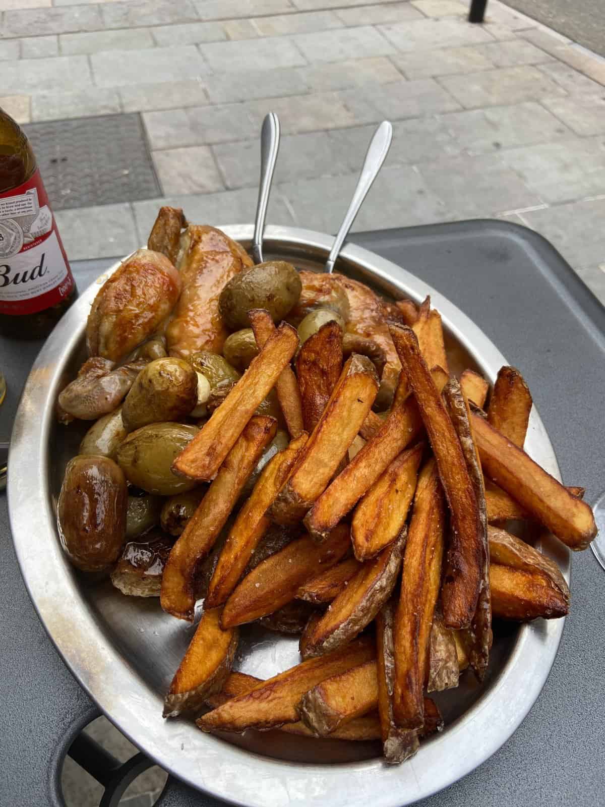 Plate of chicken potatoes and fries from La Petite Rôtisserie - Orange