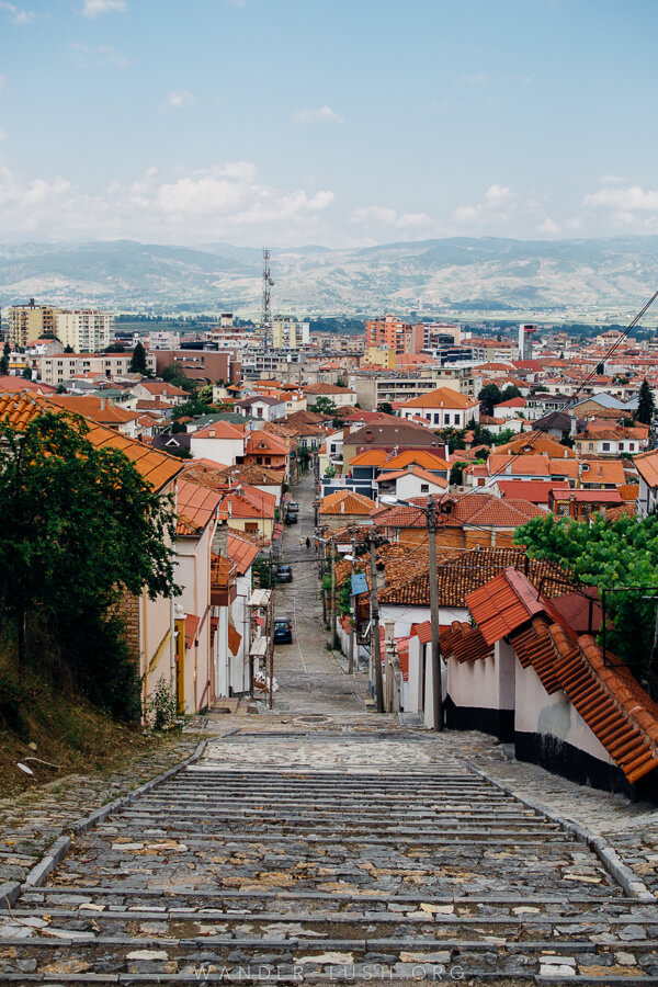 Stone steps leading down to the city of Korca.