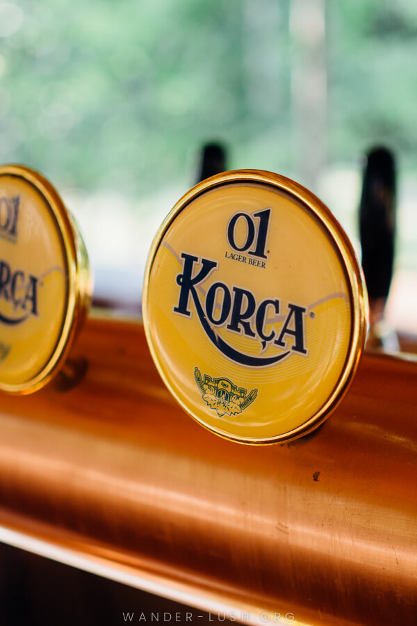 A beer tap reading 'Korca'.