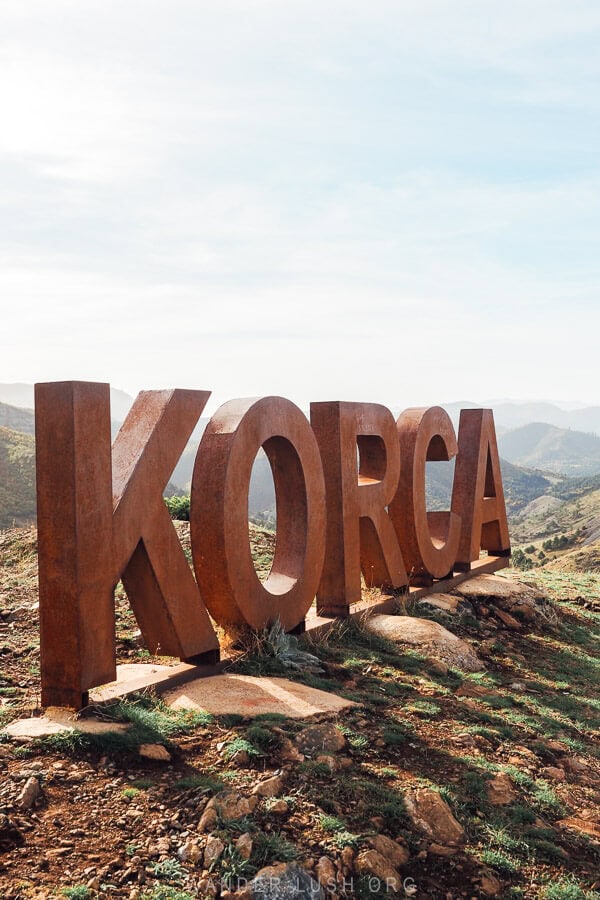 A metal sign reads Korca.